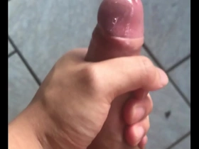 A young Asian boy reaches his climax