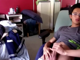 Young gay Asian man fights boredom with masturbation.