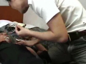 A young Korean man enjoys a banana in a rather perverted manner.