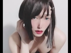 A female cross dresser in a sexy costume